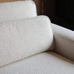 Bank Richie Ottomane links Bouclé wit