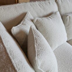 Bank Richie Ottomane links Bouclé wit