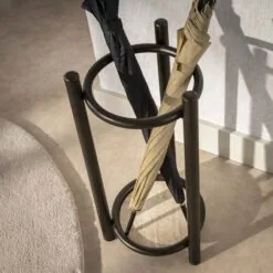 Patrick Paraplubak rond Brons metaal